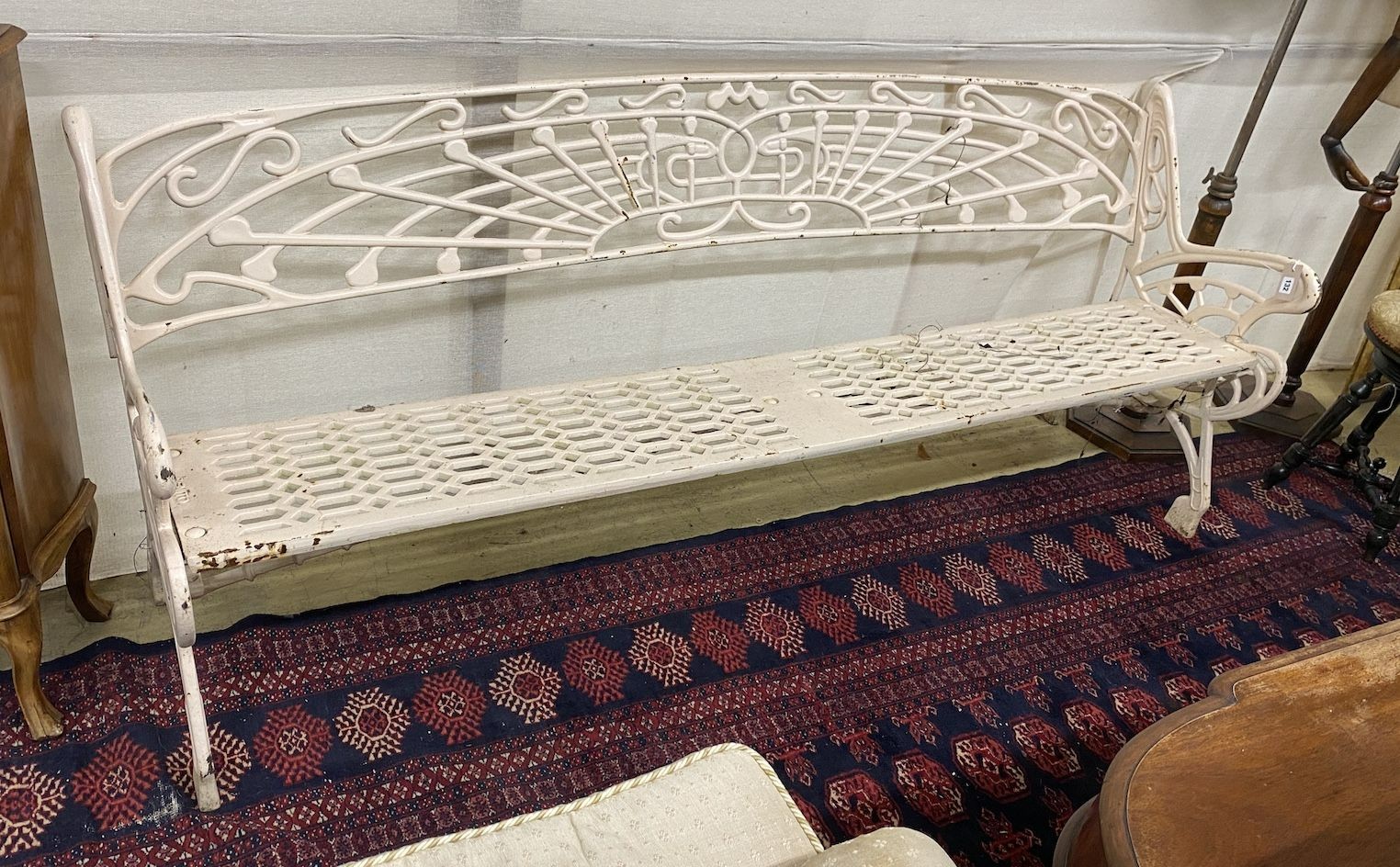 A Benito cast iron Art Nouveau style garden bench, length 204cm, depth 60cm, height 82cm
